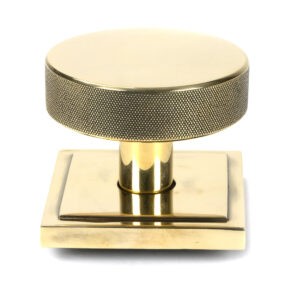 aged brass brompton centre door knob (square)